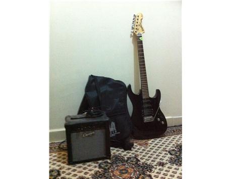 Washburn X-Series Parlak Siyah Elektro Gitar & Cruzer 10W Amfi