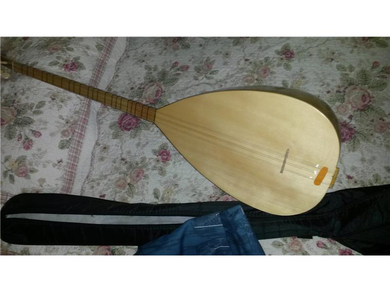 Hiç kullanılmamış bağlama gitar ile takas (akustik veya elektro farketmez) Trabzon